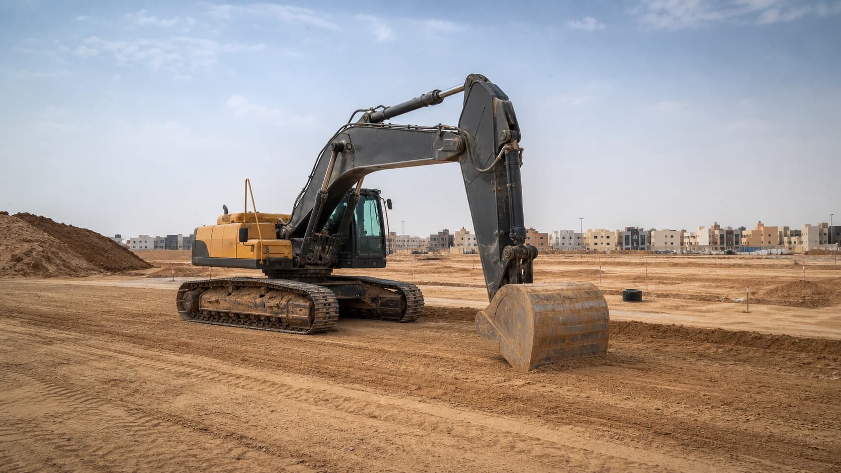 Excavator preparing a Saudi construction site